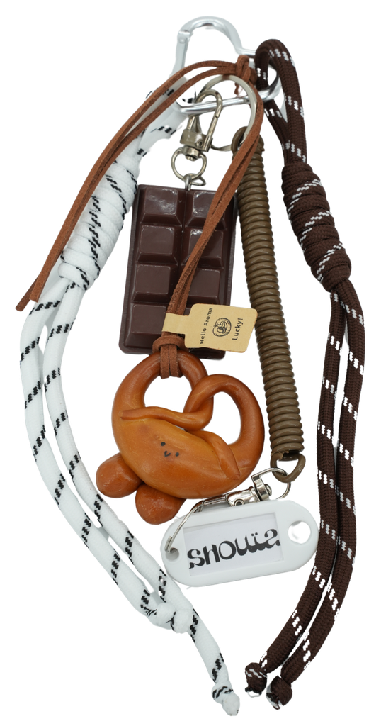 SHOUIA - BROWN "PRETZEL" BAG CHARM